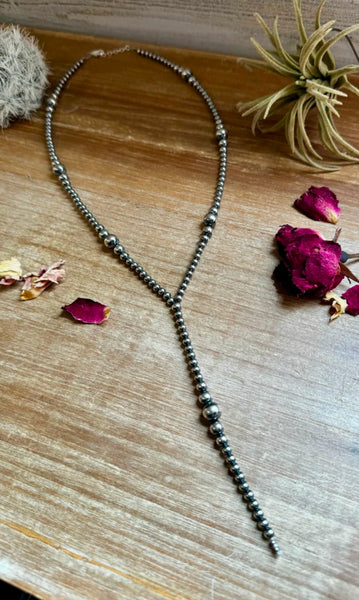 Lariat graduated sterling silver pearl