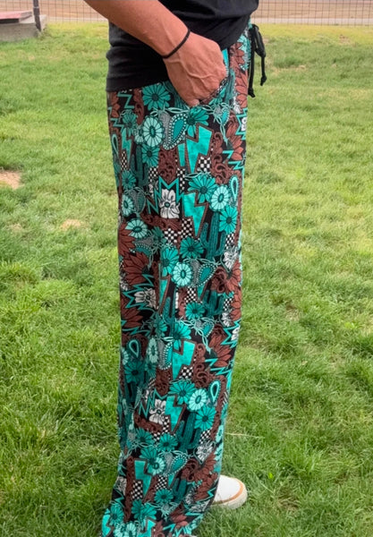 Tattoos in Turquoise Pants