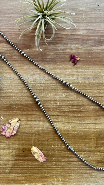 28 inch graduated Sterling Silver Pearls necklace