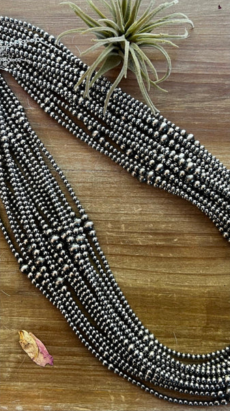 28 inch graduated Sterling Silver Pearls necklace