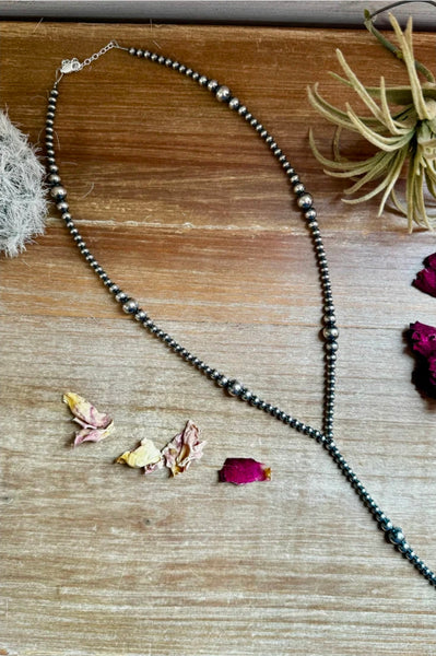 Lariat graduated sterling silver pearl