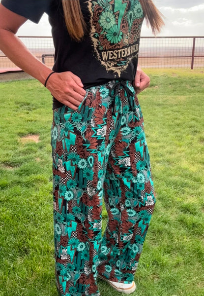 Tattoos in Turquoise Pants