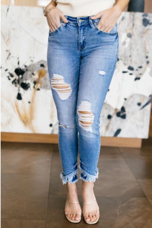 Distressed Mid Rise Skinny Jeans