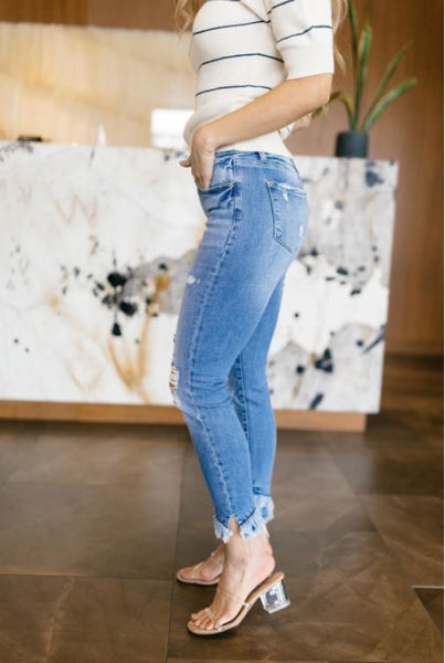 Distressed Mid Rise Skinny Jeans